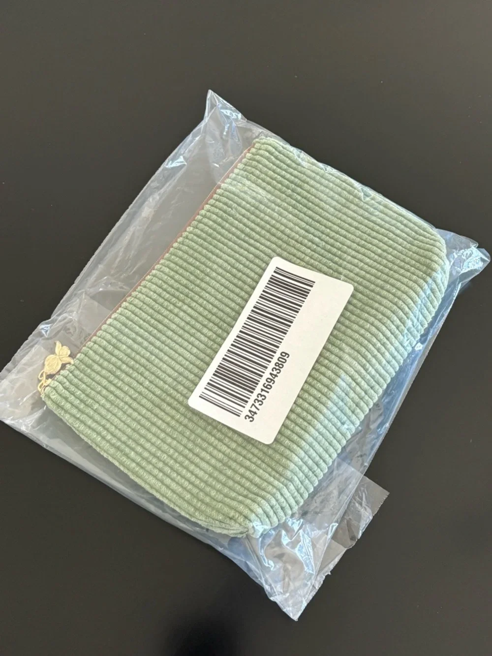 Sisley Green Ribbed Cosmetic Case